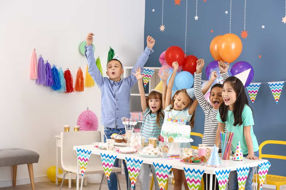 Little children celebrating Birthday at home