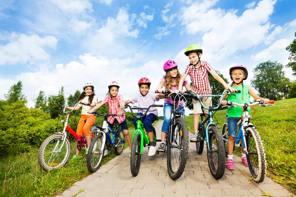 Kids having fun biking with their friends