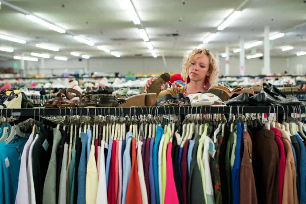 Woman shopping in a thrift store.