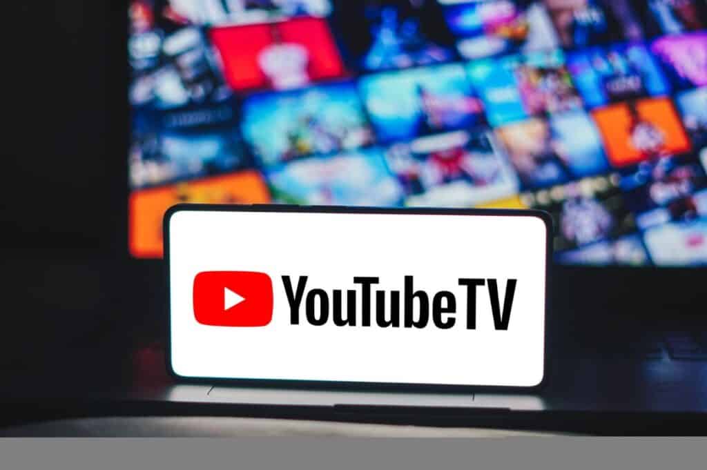 YouTube TV logo is displayed on a smartphone screen